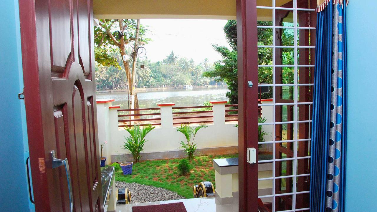 Punerjeni Homes Alappuzha المظهر الخارجي الصورة